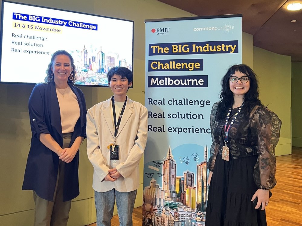 Tinh with two RMIT staff